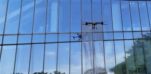 hakkında en son şirket haberleri MYUAV İHA pratik uygulaması: Shenzhen Hanjing Binası dış cephe temizliğinin verimliliği