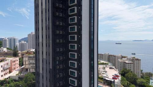 hakkında en son şirket haberleri MYUAV çift ipli UAV, Hong Kong'daki Duoli Garden'ın karmaşık perde duvarını verimli bir şekilde temizledi ve çevre dostu temizlik iyi karşılandı